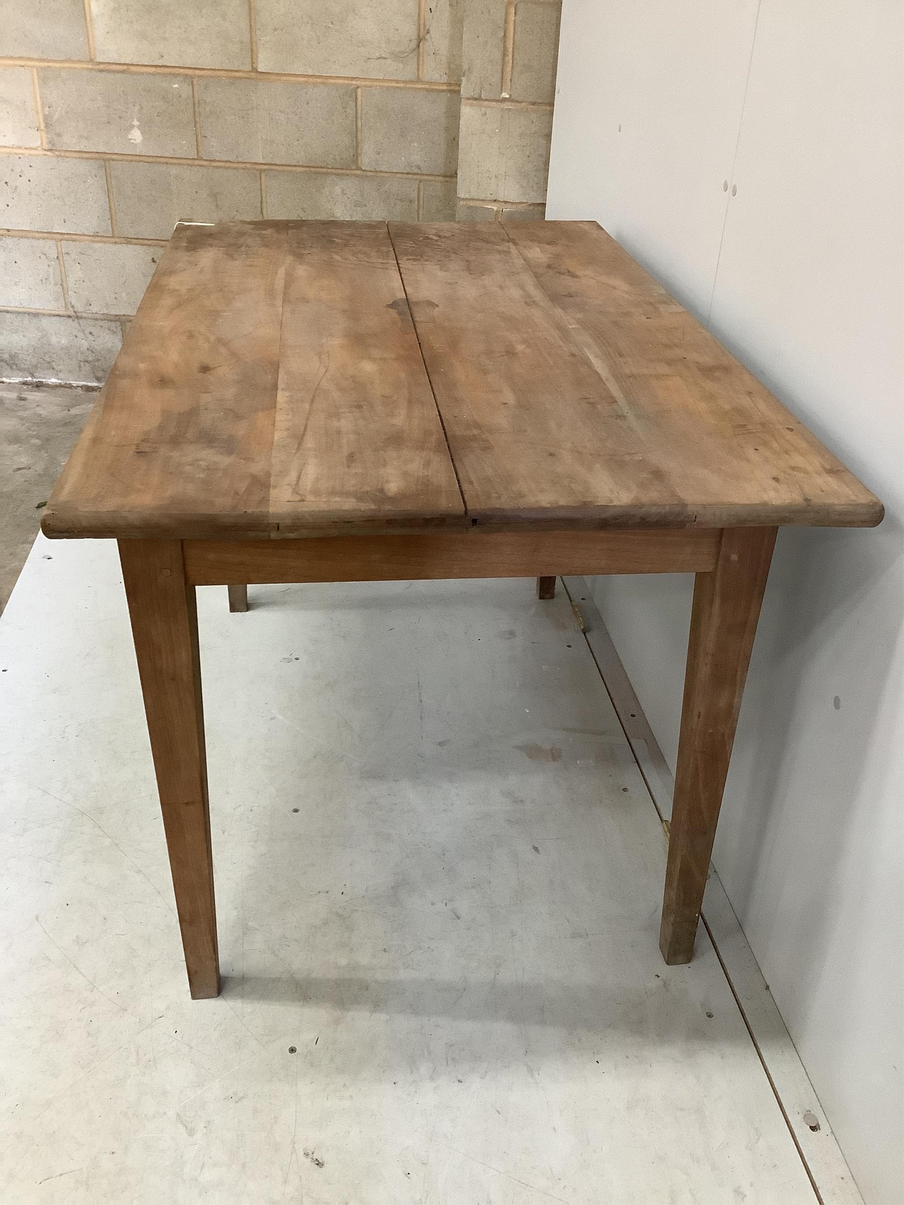 A 19th century French rectangular cherry kitchen table, width 121cm, depth 77cm, height 75cm. Condition - fair